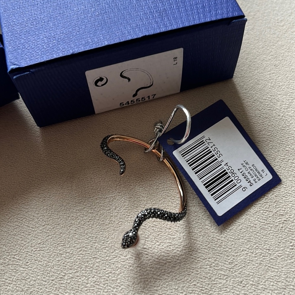 Swarovski Crystal Leslie Black Snake pierced Ear cuff. Never worn.